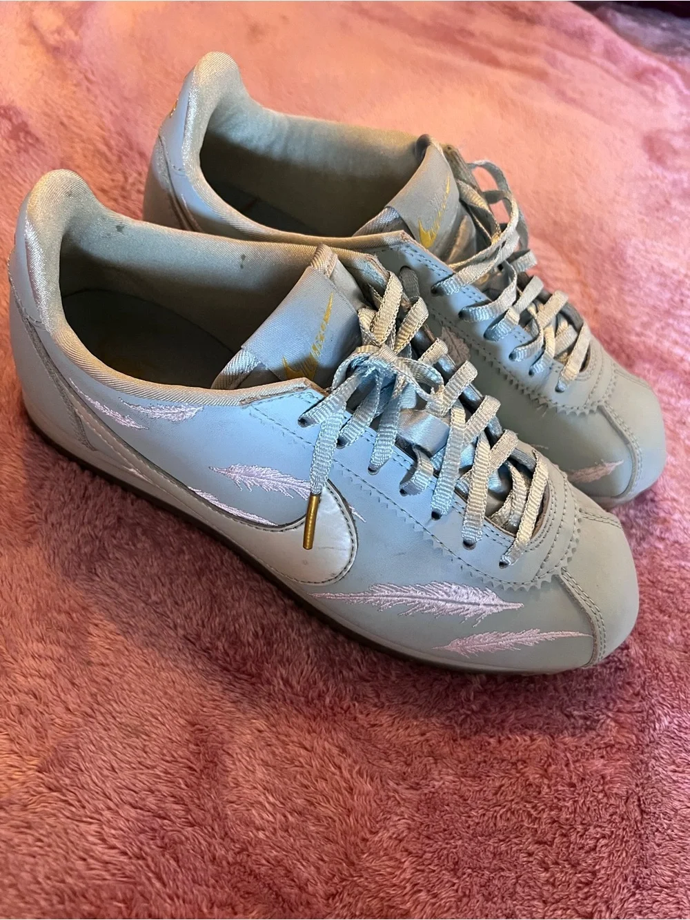 Nike Light Blue Cortez Sneakers with Pink Feather Stitching